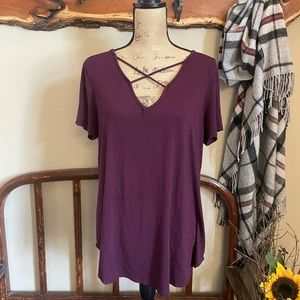 Rich purple top with strappy detail